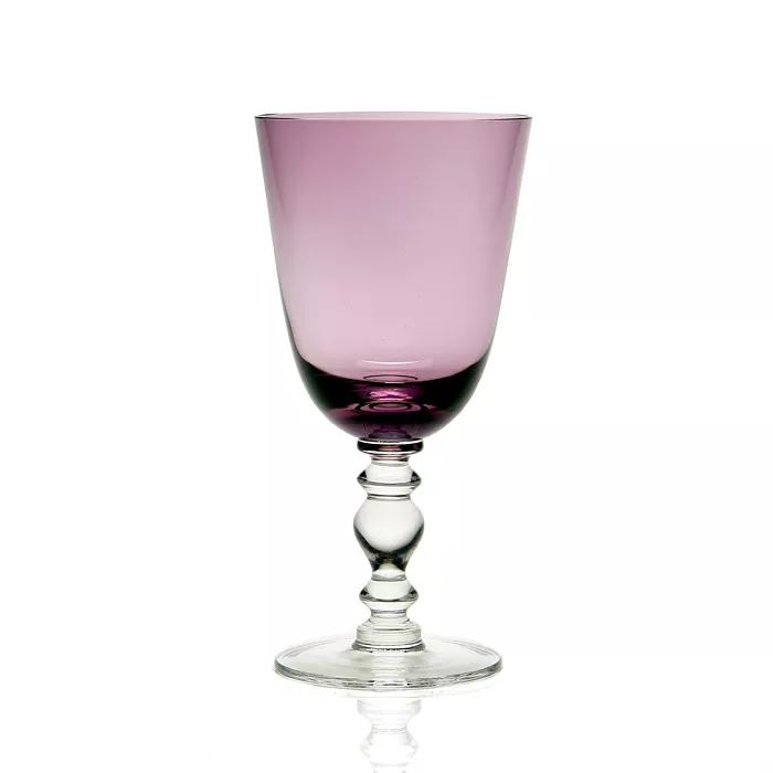 The William Yeoward Fanny Colored Country Goblet 13 oz. features a purple-tinted bowl with a clear, decorative stem and base—ideal for elegant tablescapes and shown against a plain white background.