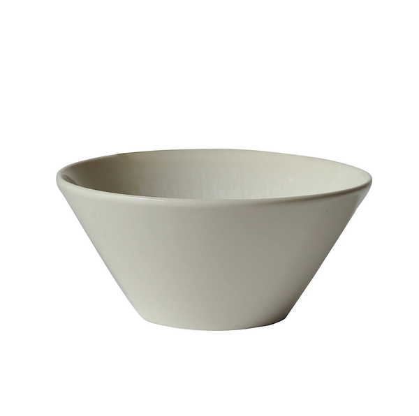 The Vuelta White Pearl bowl by Jars - Rosenthal is an off-white ceramic bowl with a wide opening, slightly angled sides, and an atoll glaze. Set against a white background, it is dishwasher safe for easy cleaning.