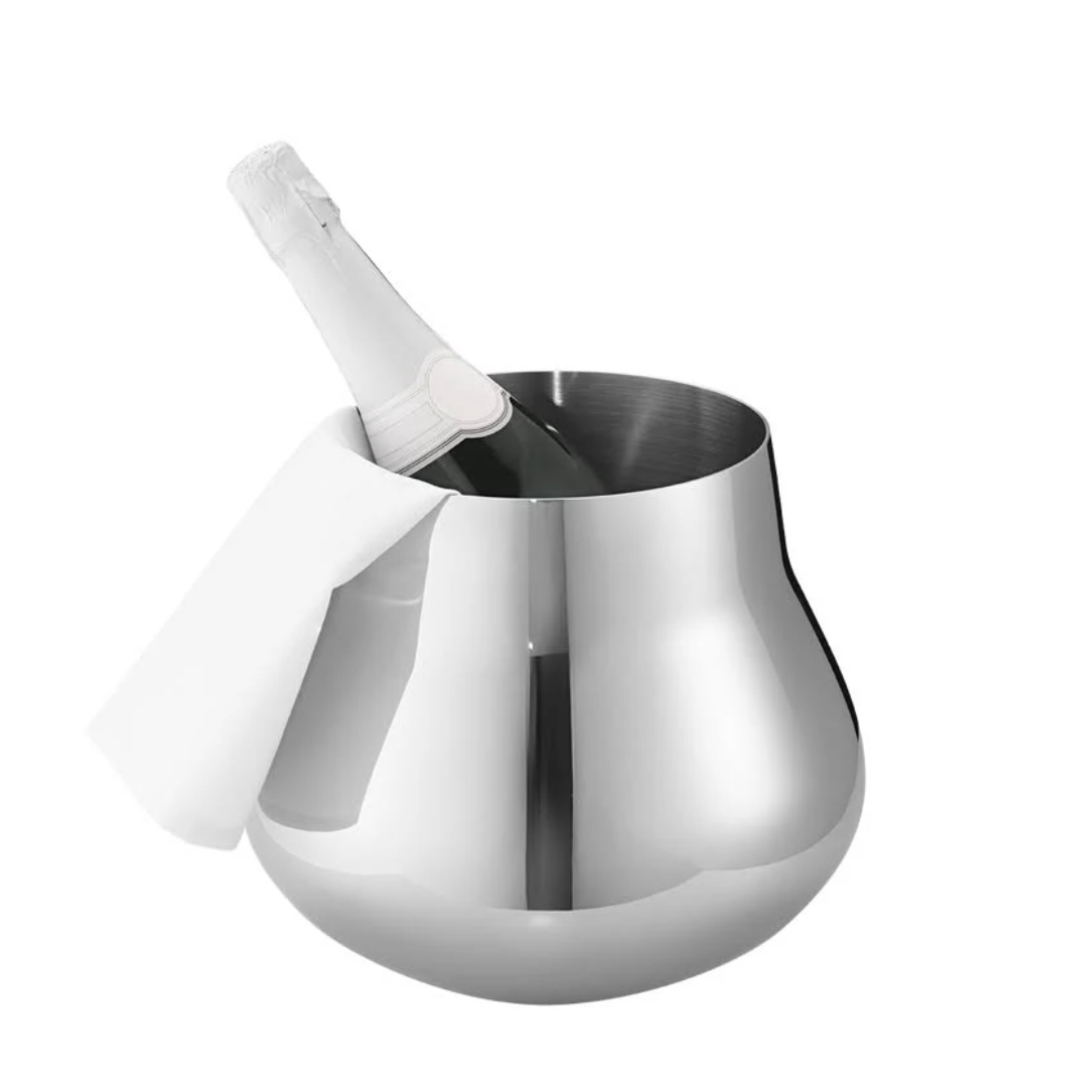 The Sky Champagne & Wine Cooler by Georg Jensen, made of shiny stainless steel, holds a wine or champagne bottle with a folded white cloth over the rim. The product is set against a plain white background.