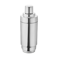 The Georg Jensen Manhattan Cocktail Shaker features a sleek, cylindrical stainless steel design with a shiny finish, cap, and built-in strainer—an essential for any home bar or barware collection.