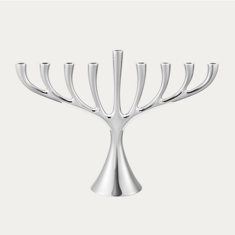 The Georg Jensen Cobra Stainless Steel Menorah features a sleek, branched design reminiscent of Scandinavian style, shown against a light gray background.