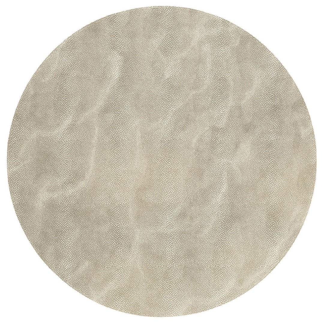 The Bodrum Stingray Round Placemat Set of 4 in Pearl features a beige pearl finish with a subtle texture and gentle marbling, adding elegance to your table.