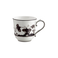 A Ginori 1735 Oriente Italiano Dinnerware Albus porcelain teacup with a black floral pattern, curved handle, and thin black rim, set against a plain white background.