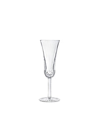 The Apollo Stemware by Saint-Louis/Hermes features a fluted bowl, slender stem, and ribbed base—an exquisite piece of mouthblown, hand-cut crystal glassware presented against a plain white background.