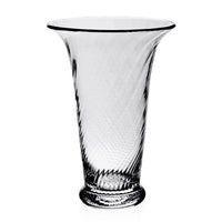 The Waves Flower Vase by William Yeoward showcases a handmade, swirling textured design with a flared opening.
