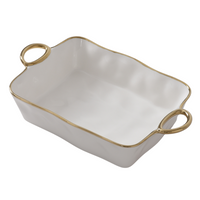 The PAMPA BAY Golden Handle Rectangle Baking Dish is a white porcelain, oven-safe dish with wavy edges, gold trim, and two elegant gold handles on opposite sides.