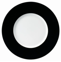 The Philippe Deshoulieres Seychelles Dinner Plate Black 11" is a Limoges porcelain round plate with a wide black rim and white center, shown from above on a plain white background.