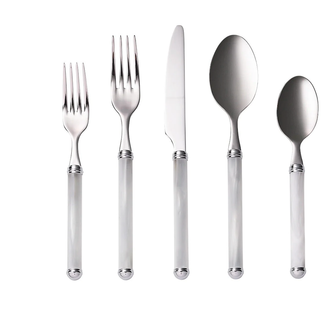 The Kim Seybert Mirage Flatware 5 pc Place Set in White/Silver includes a salad fork, dinner fork, dinner knife, soup spoon, and teaspoon arranged neatly on a white background. This stylish set is also dishwasher safe.