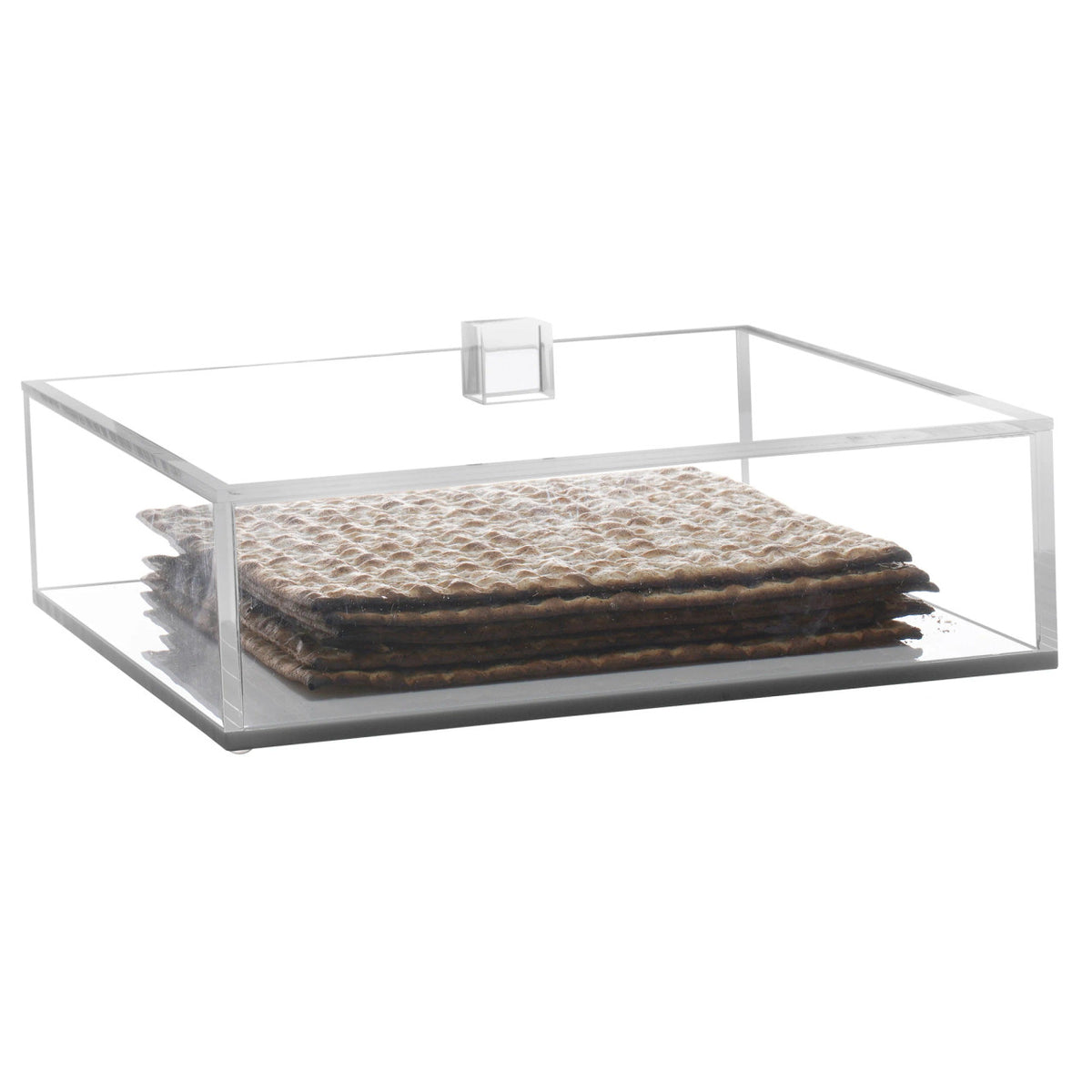 The BT-Shalom Lucite Matzah Box With Lid features a clear, rectangular design with an acrylic handle—an elegant way to display matzo crackers and enhance your table decor.