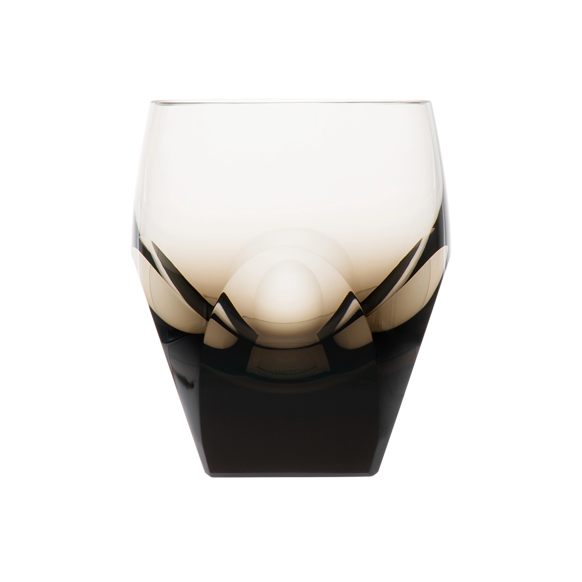 The Moser Bar Spirit Tumbler Shot Glass 45ml features a modern faceted design with a smoky gradient from clear to dark, making it an elegant addition to any bar or the perfect match for cut-crystal glasses.