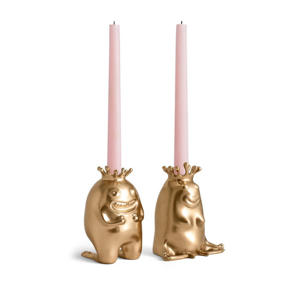 L'Objet Haas King & Queen Candlesticks are whimsical gold frog-shaped candle holders—one standing, one sitting—perfect for adding a playful touch of luxury to your home décor.