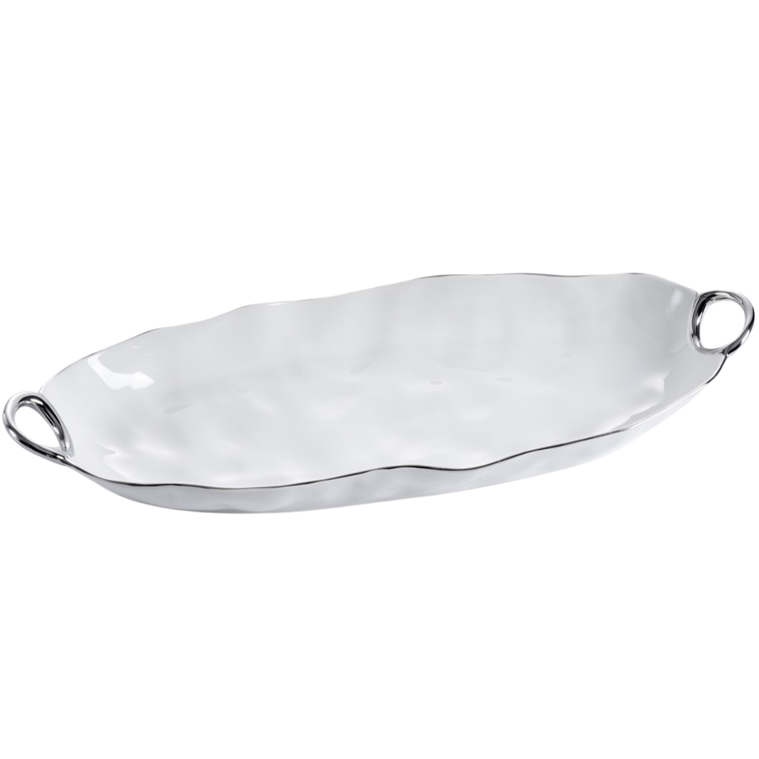 The PAMPA BAY Handle Deep Serving Platter Silver is a large, oval porcelain platter with a glossy finish, wavy edge, and two silver loop handles—an elegant serveware choice for any occasion.