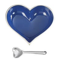 The Happy Heart Snack Bowl & Spoon by Inspired Generations features a blue heart-shaped handcrafted aluminum bowl with a white rim and a small silver heart-shaped spoon, ideal as a candy dish, shown on a white background.