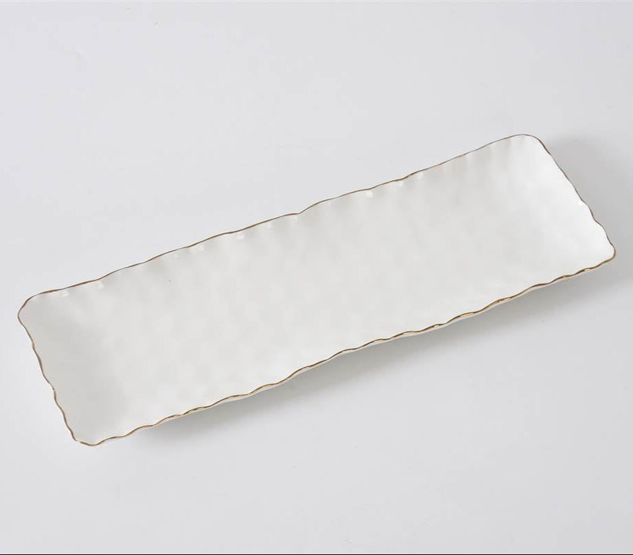The PAMPA BAY Portofino Rectangle Serving Platter - NEW! features a textured porcelain surface and gold-accented wavy edges, displayed on a plain white background.