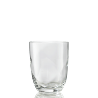 The Idra Tumbler Lente by Nason Moretti stands upright, empty and clear, on a white background with a subtle reflection beneath.