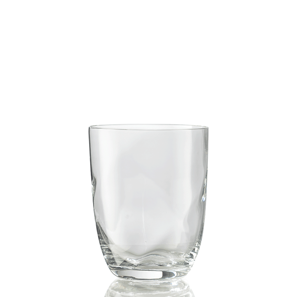 The Idra Tumbler Lente by Nason Moretti stands upright, empty and clear, on a white background with a subtle reflection beneath.
