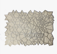The Apeloig Geometric Challah Cover features an abstract design with interconnected triangles and polygons in white and light gray, Hebrew text, and an irregular mosaic pattern—perfect as a modern or unique laser-cut challah cover.