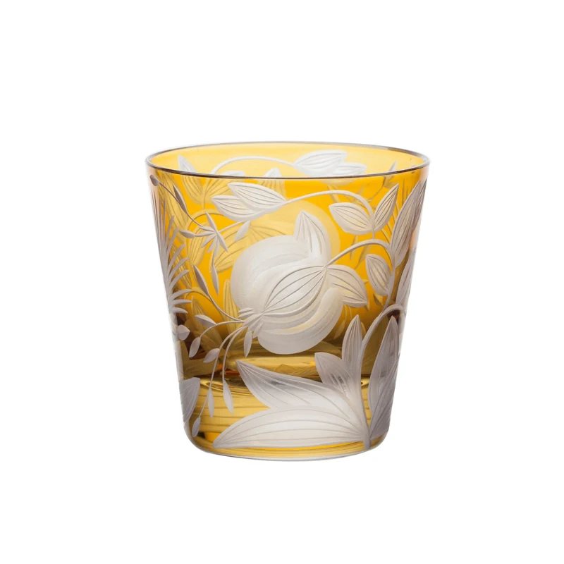 Amber-colored Artel Verdure Vodka / Liqueur -Bright Colors - crystal tumbler featuring etched floral and pomegranate designs.