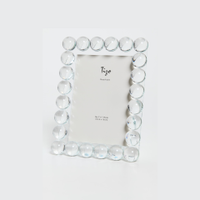 The Tizo Crystal Ball Frame features sparkling crystals and round glass beads along its rectangular edges, standing upright against a plain background with a blank placeholder—ideal for luxury home decor.