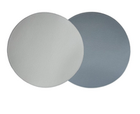 Two circular, reversible placemats from Von Gern Home (set of 4) overlap; the left is light gray, the right medium blue-gray. Each features subtle texture, ideal for an elegant table setting against a white background.