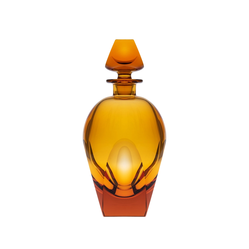 The Moser Bar Decanter 750 ml features a geometric amber glass design with a matching stopper and elegant curves, reminiscent of luxury exclusive Bar collections, all set against a white background.