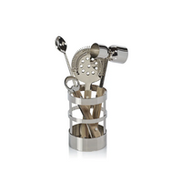 The Zodax Belmont 5 Piece Bar Tool Set features a stainless steel jigger, strainer, bottle opener, stirring spoon, and more in a sleek cylindrical stand—ideal for organizing your home bar and mixing cocktails in style.