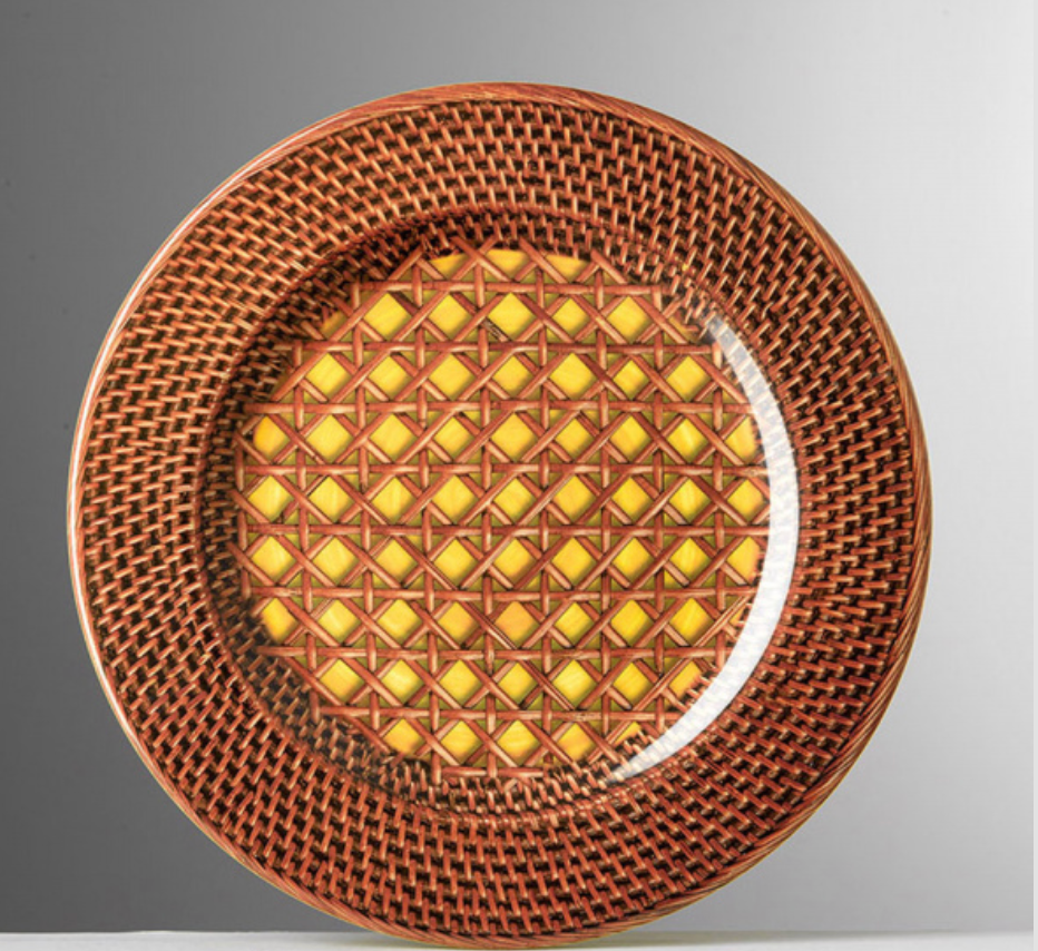 The NEW! Patagonia Yellow Melamine Dinnerware by Mario Luca Giusti features a woven rattan basketweave pattern in brown and yellow, with a dense rim design. Durable and dishwasher safe, it’s a stylish addition to any dinner set.