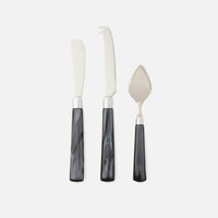 The Blue Pheasant Colson Cheese Knives Set of 3 features stainless steel blades and marbled black handles, including a spreader, fork-tipped knife, and pointed knife—ideal for serving any cheese board.