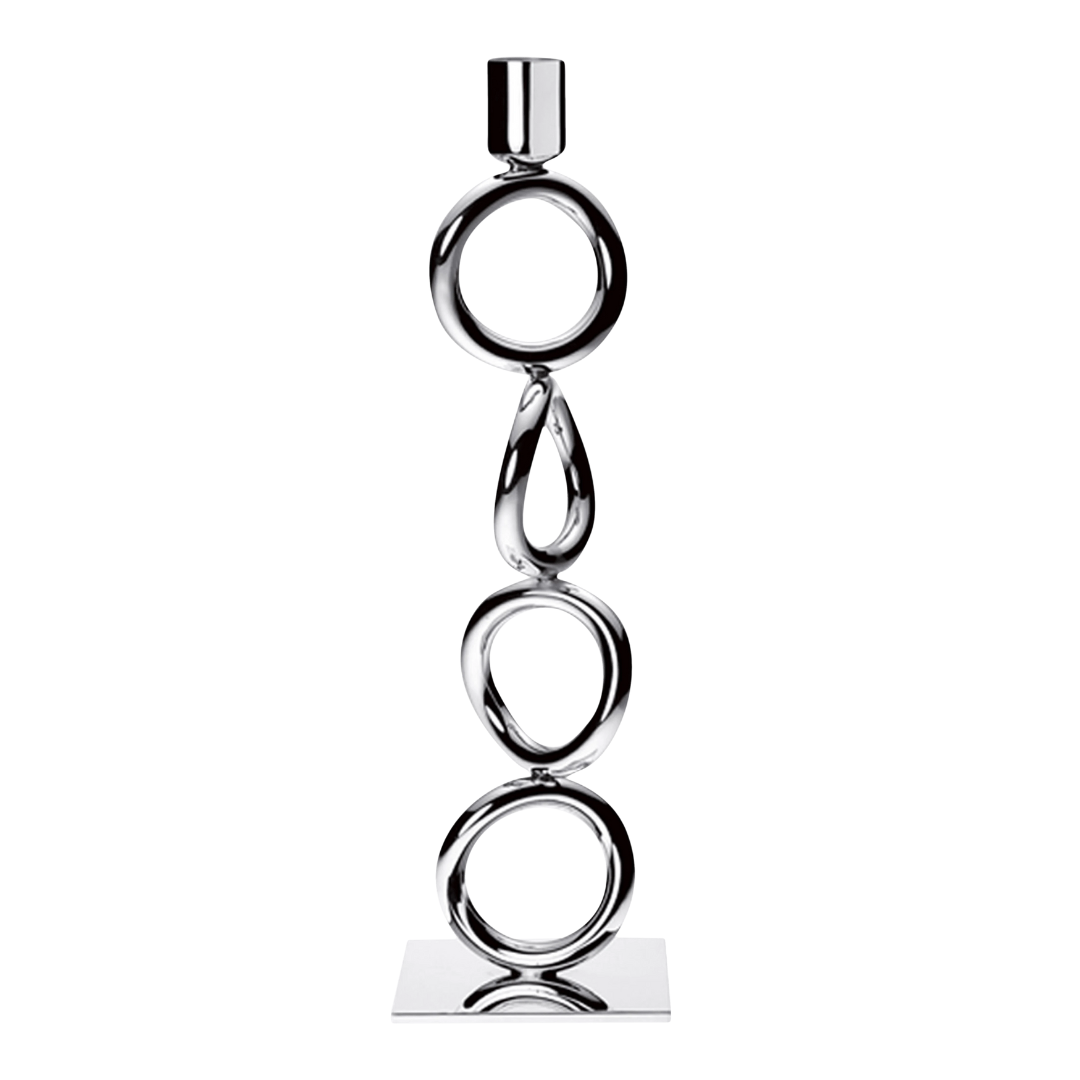 The Christofle Vertigo Silver Plated Candlestick features a modern vertical design with three interlocking rings, a teardrop shape, and a square base—ideal for those who appreciate striking candlesticks.