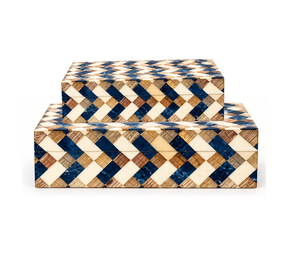 Two Brett Bone Boxes by A Sanoma Inc—rectangular boxes with lids, adorned with a geometric cream, brown, and blue chevron design—are stacked against a white background, making them an ideal accent piece for any modern aesthetic.
