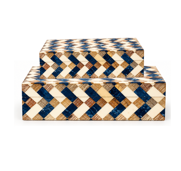 Two Brett Bone Boxes by A Sanoma Inc—rectangular boxes with lids, adorned with a geometric cream, brown, and blue chevron design—are stacked against a white background, making them an ideal accent piece for any modern aesthetic.