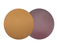 Two round, textured reversible placemats from Von Gern Home—one tan, one purple—overlap slightly. Their subtle pebbled surface makes them perfect for creating an elegant table setting on a crisp white background. Set of 4.