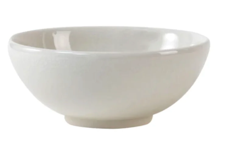 The Jars - Rosenthal Tourron Dinnerware Neige is a handmade, durable, round white ceramic bowl from France with a smooth surface, shown on a white background.