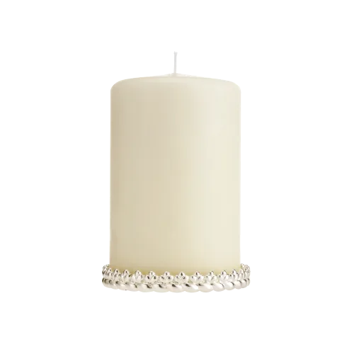 The Babylone Silver Plated Candle Holder by Christofle features a sleek silver band, echoing luxury and sophistication—ideal for elevating your home decor.