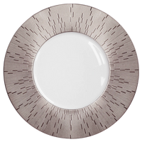 The Infini Prestige Platinum Dinnerware by Haviland is a round white Limoges porcelain plate with a wide platinum border featuring thin radiating lines in a modern, geometric design.