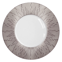 The Infini Prestige Platinum Dinnerware by Haviland features a round white Limoges porcelain plate with a wide, hand-painted rim adorned with thin, dark radial lines and a metallic sheen for an elegant, modern touch.