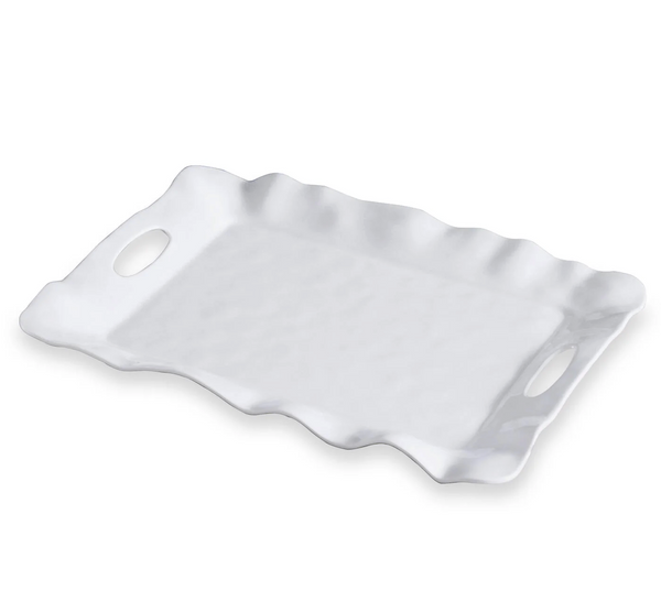 White wavy ceramic serving tray on a white background