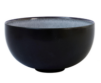 The Tourron Ecorce Dinnerware Bleu & Grey bowl by Jars - Rosenthal features a simple, round design with a matte finish—durable stoneware perfect for everyday use, shown here against a white background.
