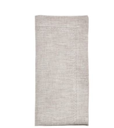 The Kim Seybert Classic Napkin - Earthtones Set of 4 features light beige linen with decorative edge stitching, ideal for adding an elegant touch to any tablescape. Displayed on a white background, these napkins enhance any dining setting.