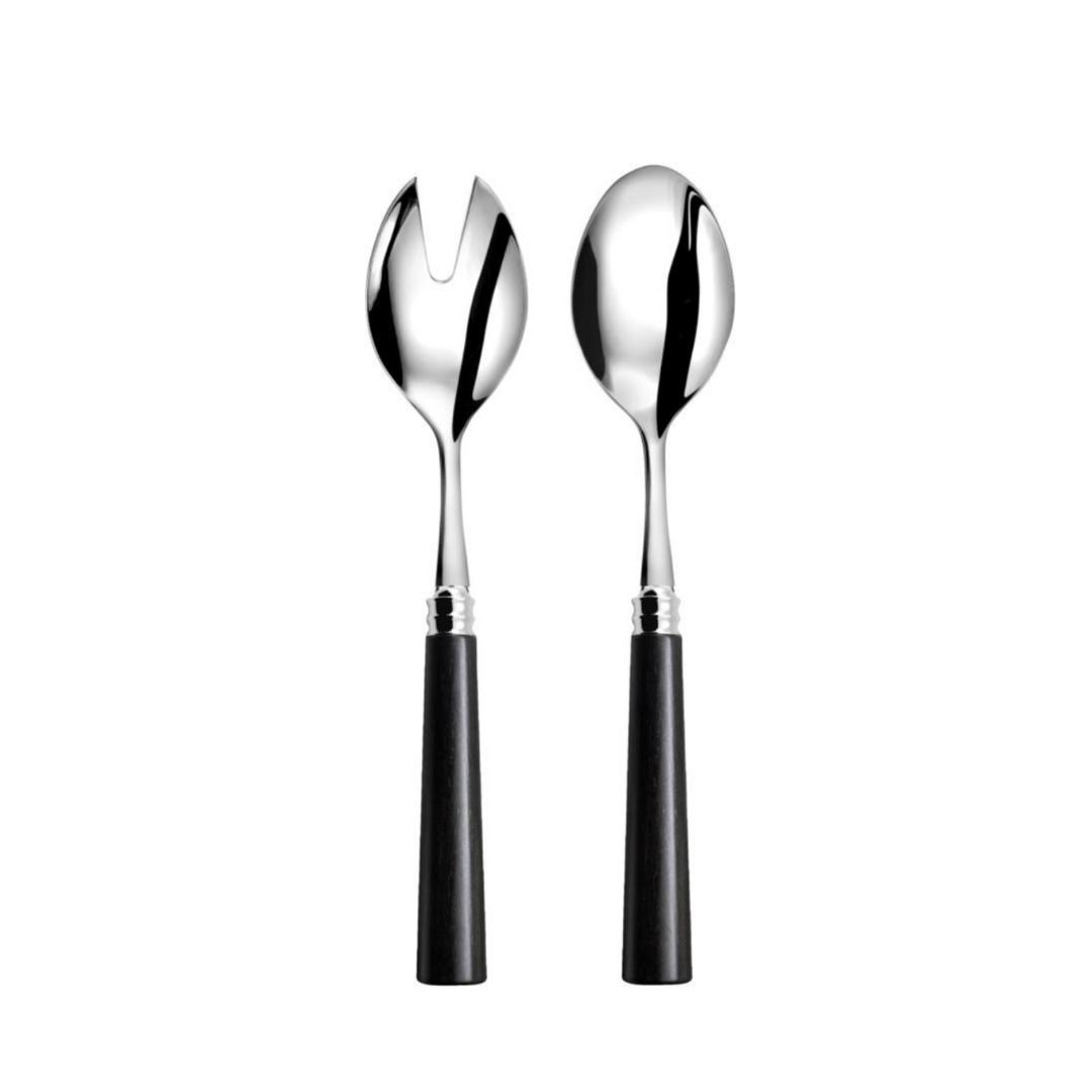 Two Capdeco Marat Wood Flatware salad servers, featuring sleek black handles and crafted from stainless steel, are shown side by side on a white background—one with a slotted fork head, the other with a solid spoon head.