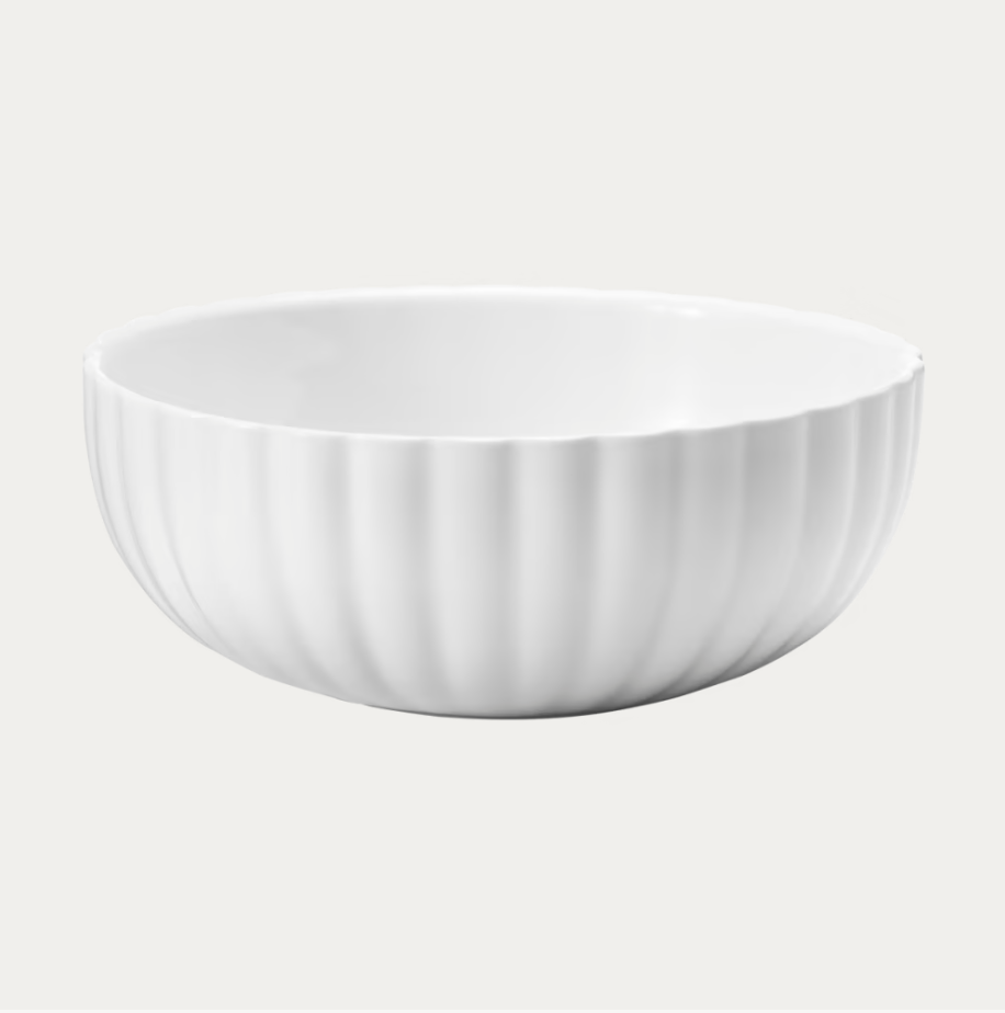 A white, round ceramic bowl with a fluted stripe design from the Bernadotte Dinnerware collection by Georg Jensen, shown against a plain light background.