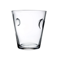 The Nude Glassware Glacier Cooler is a clear, lead-free crystal tumbler featuring a slightly flared rim and two crescent-shaped indentations, shown empty against a plain white background.