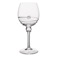 The Amalia Glassware by Juliska features clear glass wine glasses with a decorative chain-like rim and embossed bowl detail—handmade to highlight Juliska's Bohemian glass artistry.