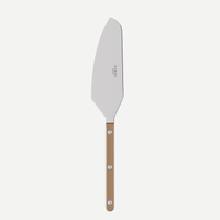 The Sabre Bistrot Pearly Tart Slicer features a wide, angled stainless steel blade and a light brown handle with three metal rivets. Customizable cutlery options available. Displayed on a plain white background.