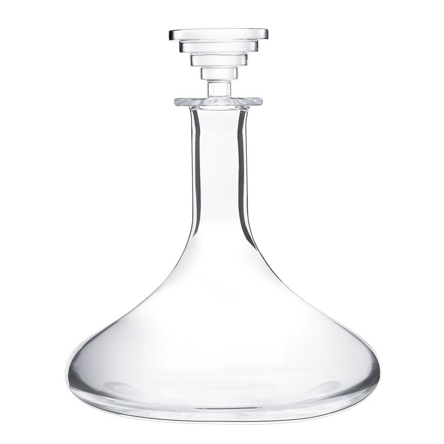The Oxymore Wine Decanter by Saint-Louis/Hermes features clear glass, a wide rounded base, narrow neck, and a stepped geometric stopper—an elegant tableware piece inspired by the classic Oxymore design.