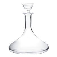 The Oxymore Wine Decanter by Saint-Louis/Hermes features clear glass, a wide rounded base, narrow neck, and a stepped geometric stopper—an elegant tableware piece inspired by the classic Oxymore design.