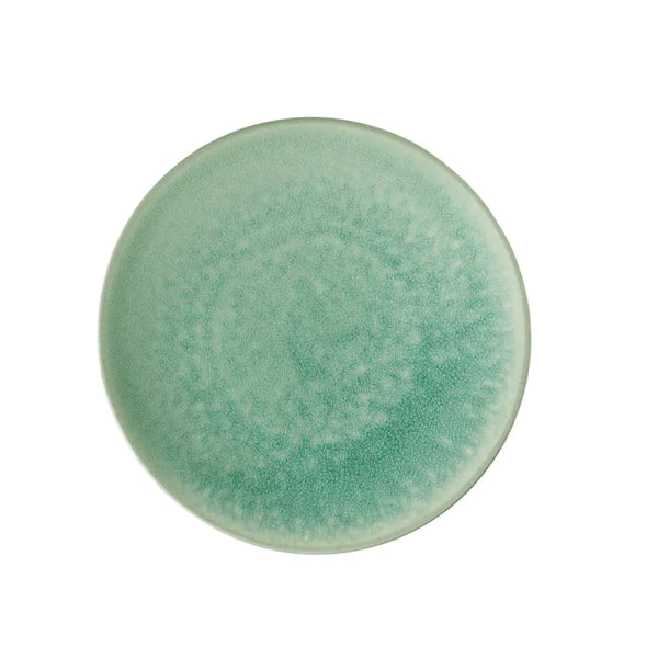The Tourron Dinnerware Jade plate by Jars - Rosenthal features a round, speckled green design with a darker rim—timeless dinnerware from above against a white background.