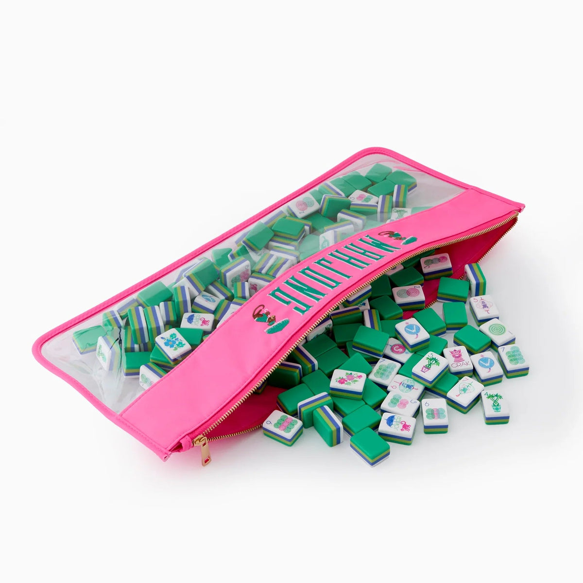 The Oh My Mahjong Mahjong Tiles Set - Jasmine features green and white acrylic tiles spilling from a clear pink zippered pouch, perfect for your next mahjong game.