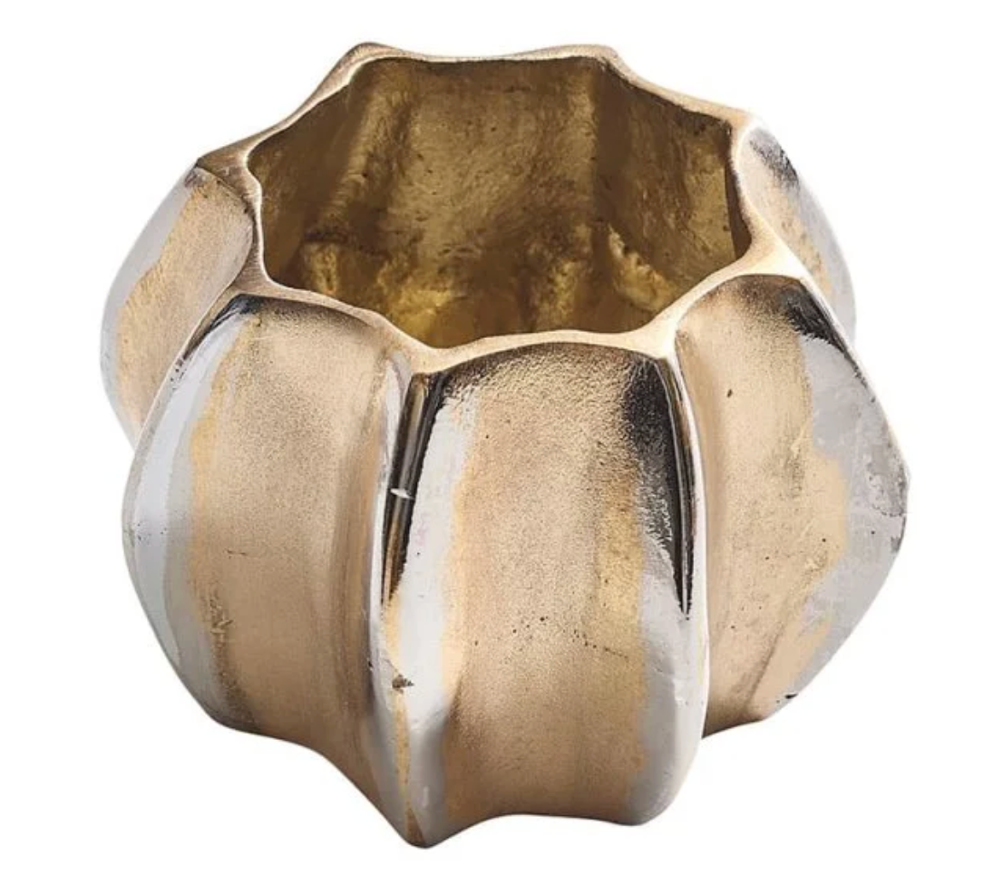 The Kim Seybert Desert Napkin Ring Gold & Silver Set of 4 features metallic rings with a wavy, ridged design, inspired by elegant gold and silver décor, shown on a white background.