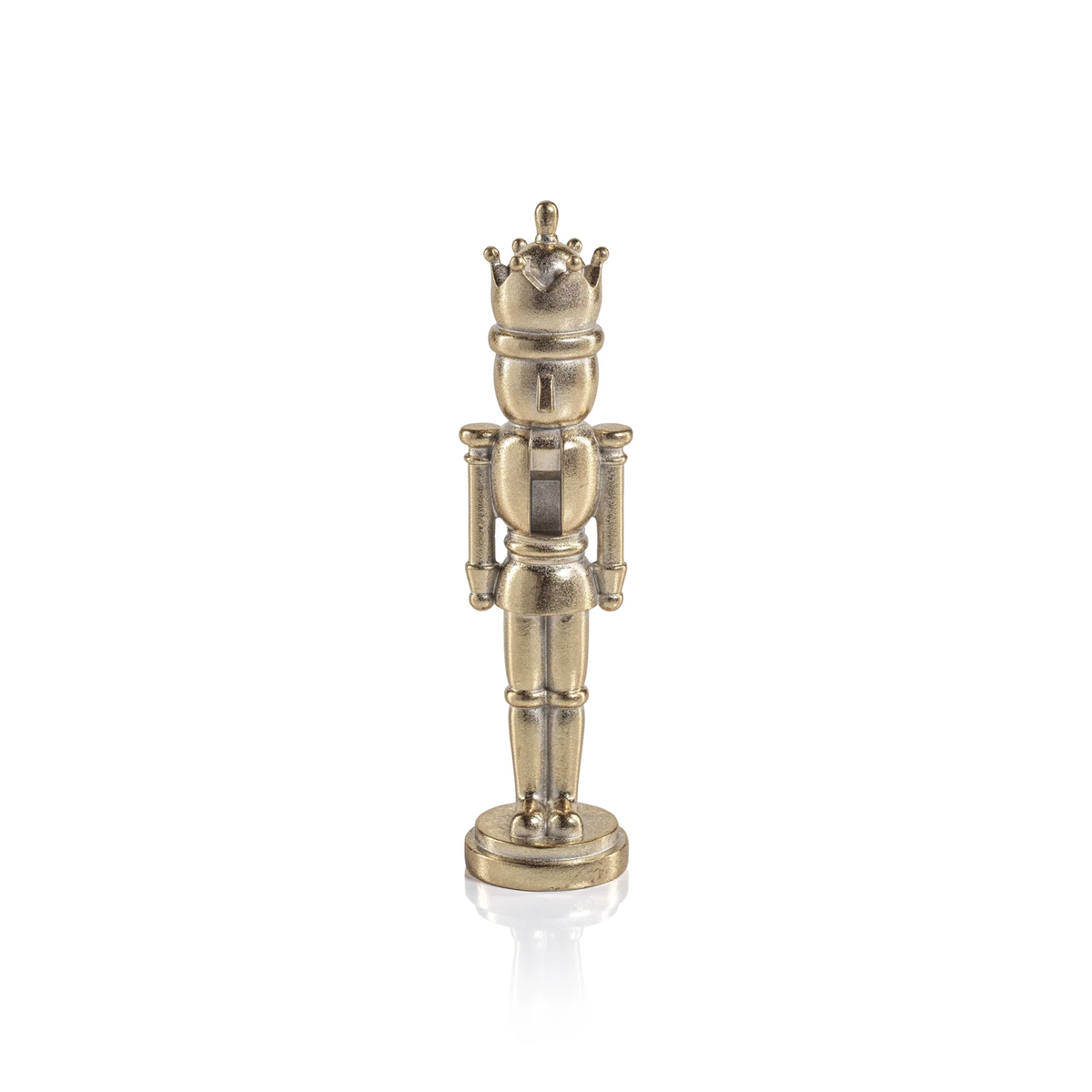 A minimalist gold-colored Zodax Nutcracker Gold Statue figurine wearing a crown.